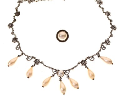 Lot 60 - A Victorian cut steel necklace of cluster and festoon design