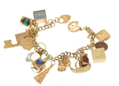 Lot 56 - 9ct gold charm bracelet