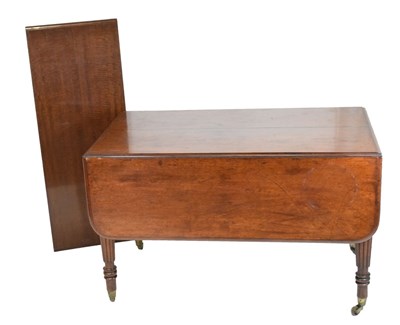 Lot 439 - Georgian mahogany drop-leaf dining table