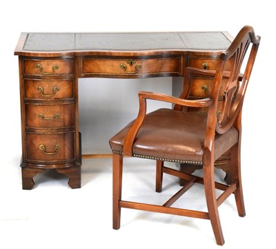 Lot 388 - Bevan Funnell - Mahogany serpentine fronted twin pedestal desk and chair