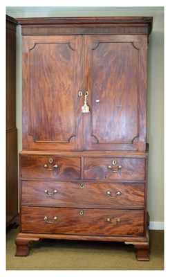 Lot 686 - Late Georgian mahogany linen press
