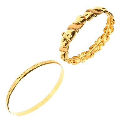 Lot 54 - Two yellow metal bangles 37.4g approx