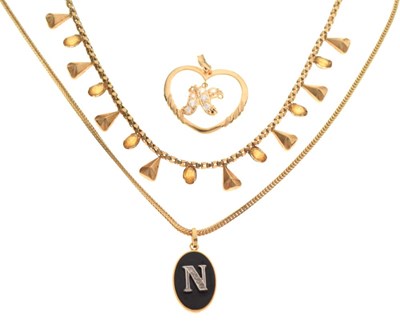 Lot 59 - Yellow metal necklace set citrine-coloured stones