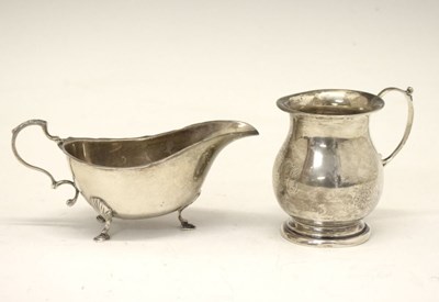 Lot 133 - Elizabeth II silver sauce boat and mug