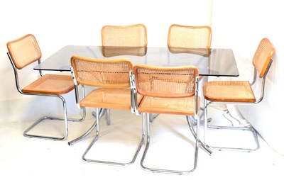 Lot 437 - Smoked glass top dining table, and set of eight cantilever chairs
