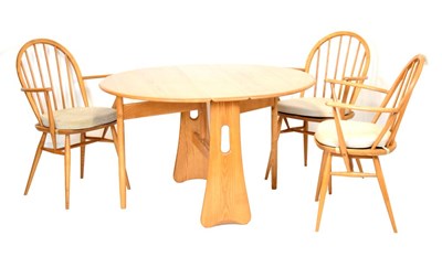 Lot 511 - Ercol drop leaf table and chairs