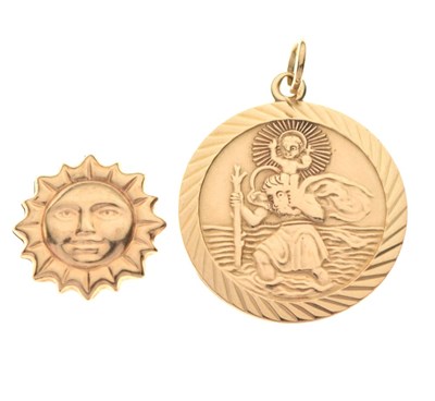 Lot 80 - 9ct gold St Christopher pendant, and an unmarked sun motif charm