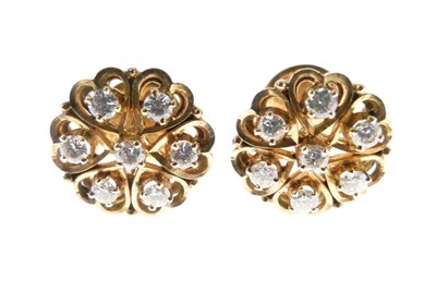 Lot 33 - Pair of seven-stone diamond cluster ear studs