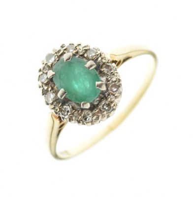 Lot 13 - Emerald and diamond cluster ring, the shank stamped '18ct'