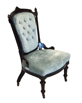 Lot 689 - Ebonised button back nursing chair