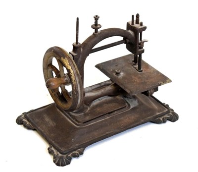 Lot 445 - 19th Century cast metal sewing machine