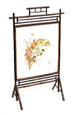 Lot 561 - Glazed painted bamboo-framed fire screen