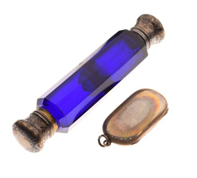 Lot 131 - Silver sovereign holder and a scent bottle