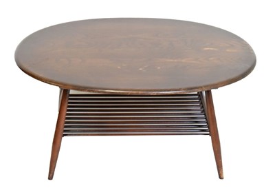 Lot 536 - Ercol golden dawn circular coffee table