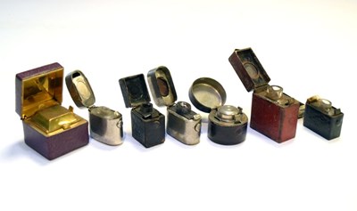 Lot 187 - Seven late 19th and early 20th Century travelling inkwells