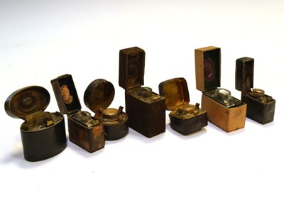 Lot 179 - Seven travelling inkwells, circa 1900