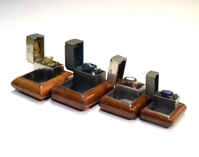 Lot 180 - Four 'Ransome's Patent' travelling inkwells