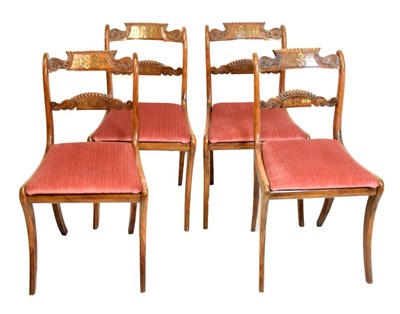 Lot 372 - Set of four Regency rosewood and brass inlaid chairs