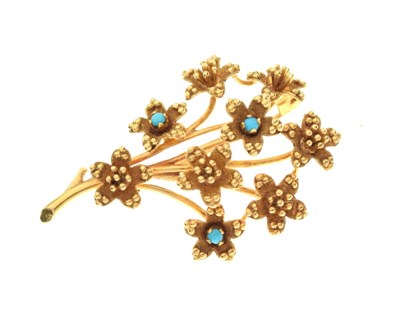 Lot 57 - 18ct gold and turquoise-set floral spray brooch