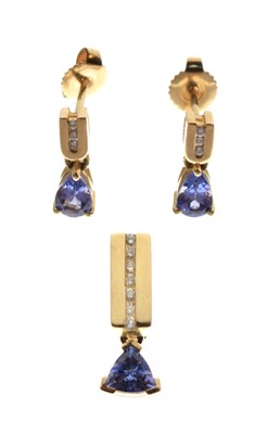 Lot 69 - Pair of 14k, tanzanite and diamond set ear studs, and a matching pendant