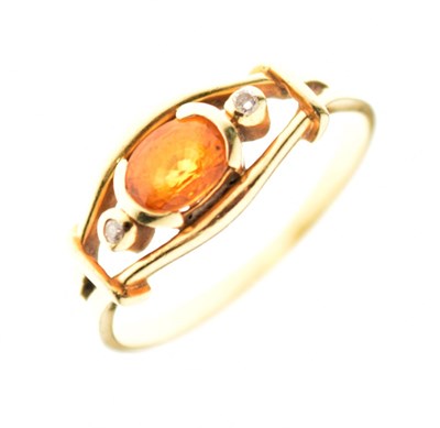 Lot 15 - Unmarked yellow metal dress ring, set faceted yellow sapphire and two diamonds