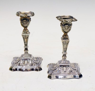 Lot 139 - Pair of late Victorian silver candlesticks