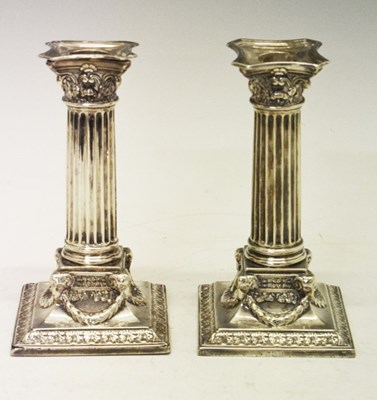 Lot 87 - Pair of silver Victorian neo-classical candlesticks of Corinthian column form