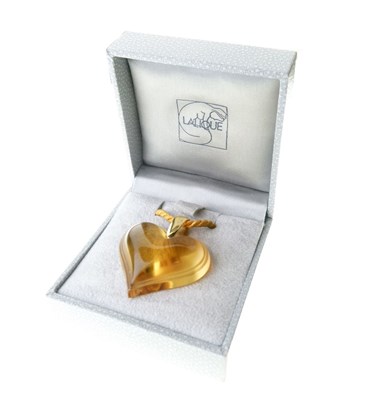 Lot 31 - Lalique, a citrine-coloured glass heart pendant