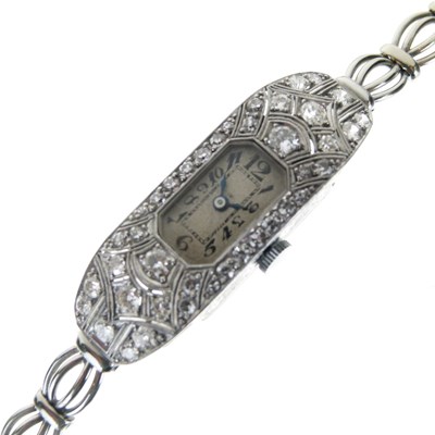 Lot 75 - Lady's diamond set cocktail watch
