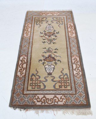 Lot 565 - Small Tibetan wool rug