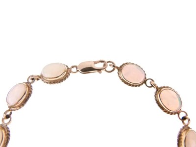 Lot 29 - Twelve-stone opal bracelet