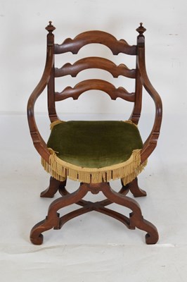 Lot 698 - Late 19th Century walnut 'X' framed open armchair