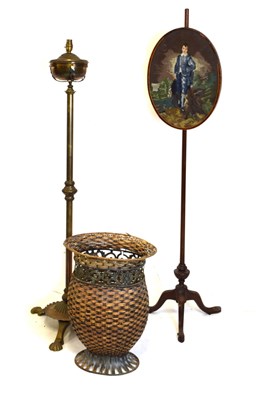 Lot 730 - Embroidered polescreen, telescopic standard lamp and wicker bin