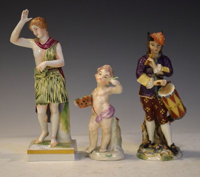 Lot 453 - Continental porcelain figure of a soldier and Naples figures
