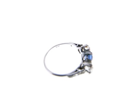 Lot 17 - Sapphire and diamond three-stone ring