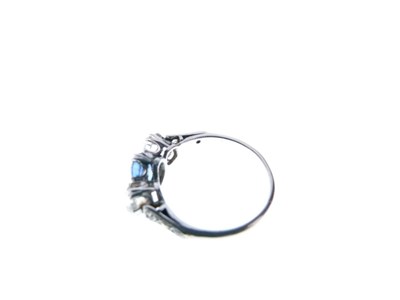 Lot 17 - Sapphire and diamond three-stone ring