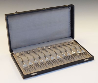 Lot 87 - Cased set of Dutch white metal flower finial cake forks