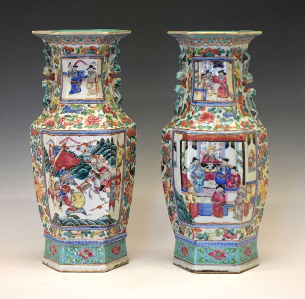 Lot 278 - Pair of Chinese Canton Famille Rose hexagonal baluster vases