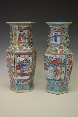 Lot 278 - Pair of Chinese Canton Famille Rose hexagonal baluster vases