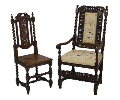 Lot 670 - William & Mary and later carved walnut open armchair