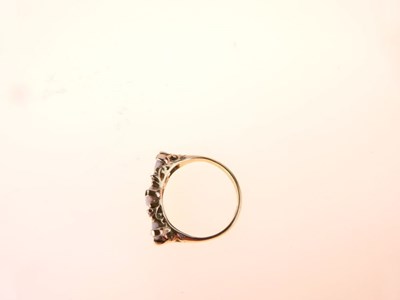 Lot 27 - Three-stone opal ring, stamped '18ct'
