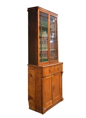 Lot 656 - Edwardian glazed bookcase on cabinet