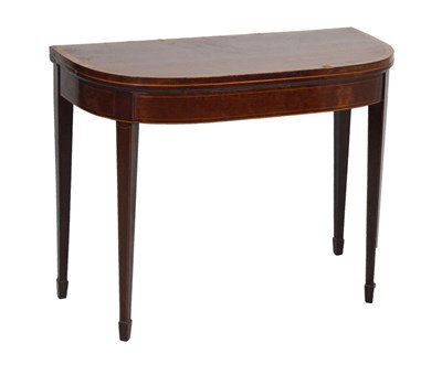 Lot 708 - Late Georgian inlaid mahogany fold-over card table