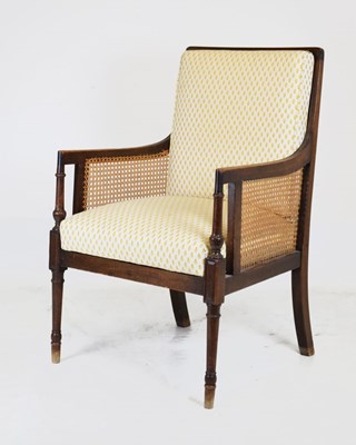 Lot 702 - Regency-style mahogany bergere armchair