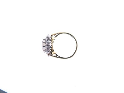 Lot 26 - Opal and diamond 18ct gold cluster ring
