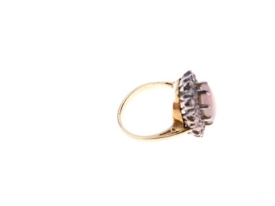 Lot 26 - Opal and diamond 18ct gold cluster ring