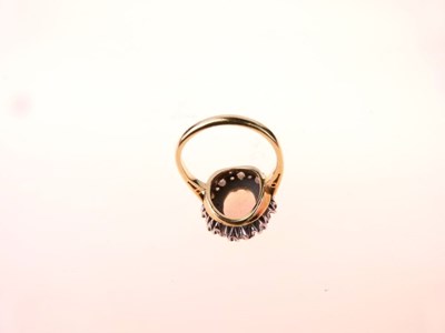 Lot 26 - Opal and diamond 18ct gold cluster ring