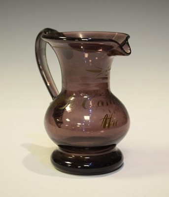 Lot 385 - Early 19th Century amethyst glass baluster cream jug