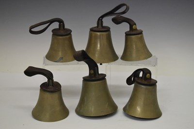 Lot 727 - Part set of hand bells