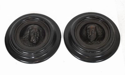 Lot 595 - Pair of late 19th Century bronzed relief portrait panels